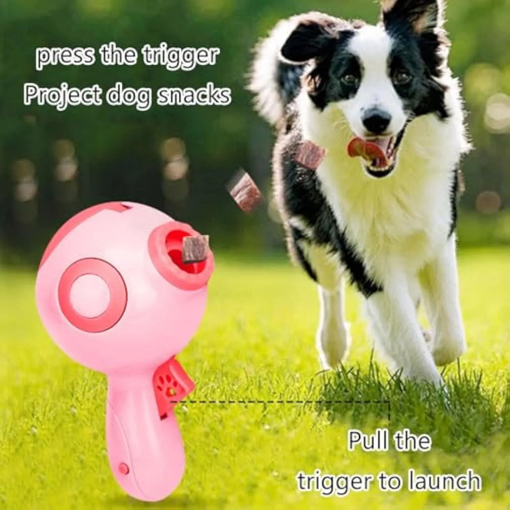15.5cm green dog treat launcher toy with remote feeding function on wooden floor