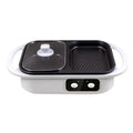 Green and white dual-use electric hot pot and frying oven appliance on a kitchen counter.
