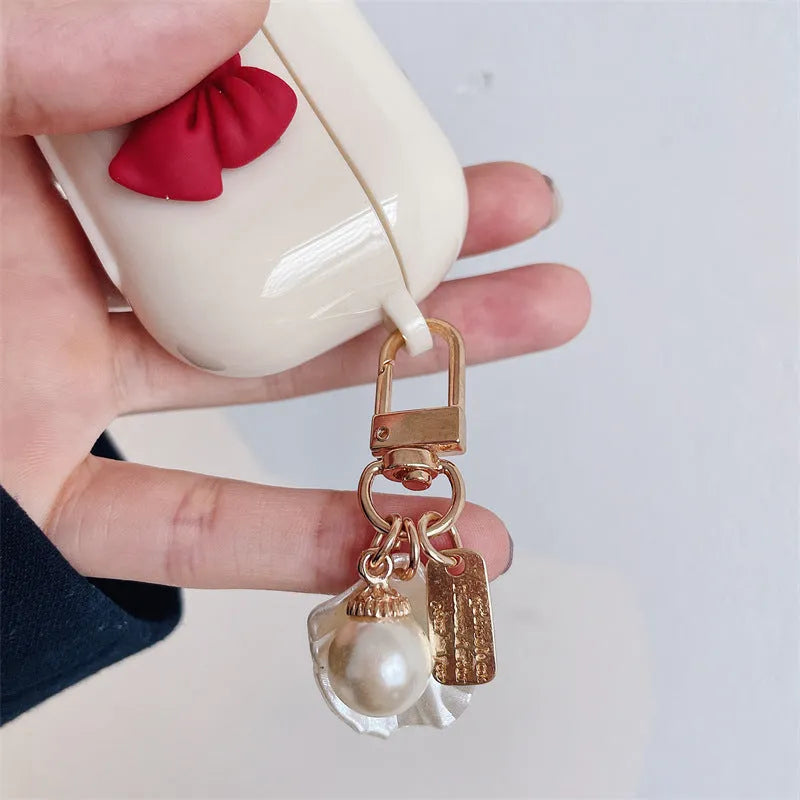 Beige red bow shell TPU clamshell case for AirPods 1, 2, 3 and Pro wireless earphones