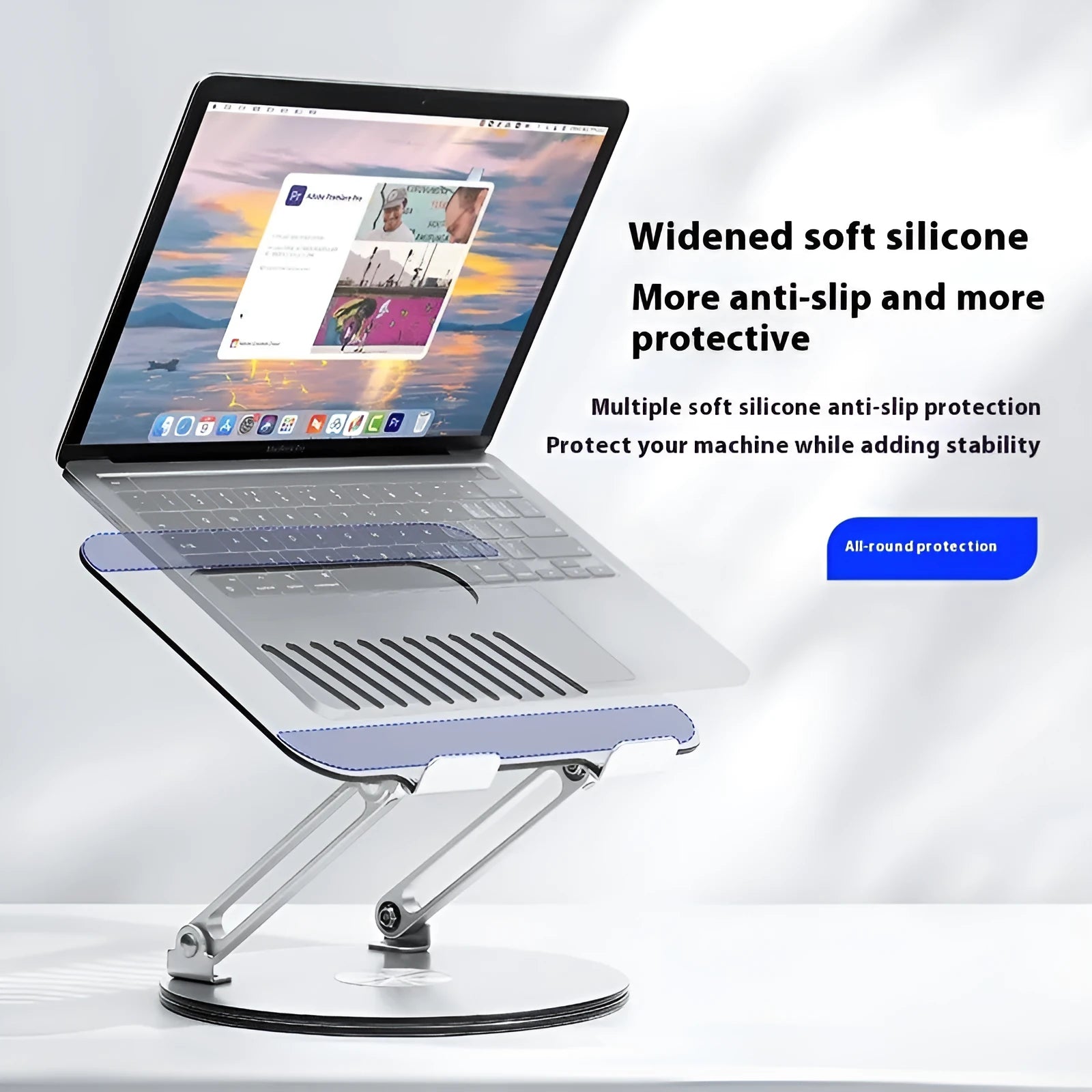 Silver aluminium alloy rotatable laptop stand with foldable design, 285 x 210 x 58 mm, on a desk