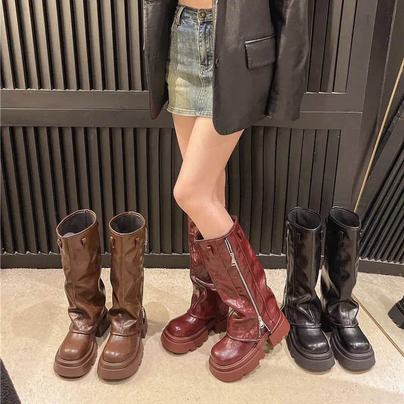 Black Platform Muffin Pants Martin Boots with square heel and high cylinder socks on a neutral background