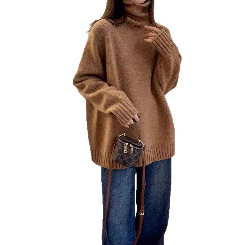 Women's loose grey turtleneck sweater with a thick knit and textured curling pile collar.