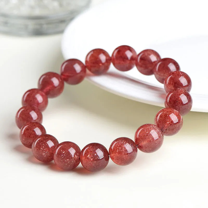 Natural strawberry quartz bracelet with geometric stones in starlight cherry red colour, shown in three size variations