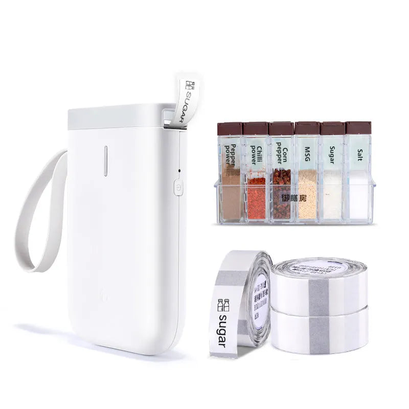 D11 compact black Bluetooth thermal label printer with LCD screen on a desk.