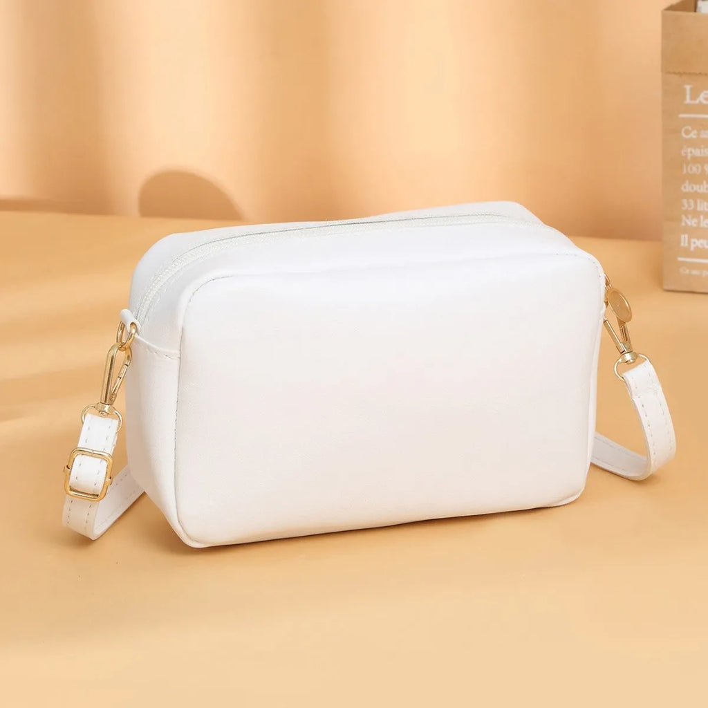 Women's solid colour PU shoulder bag with three-dimensional pockets and horizontal square shape