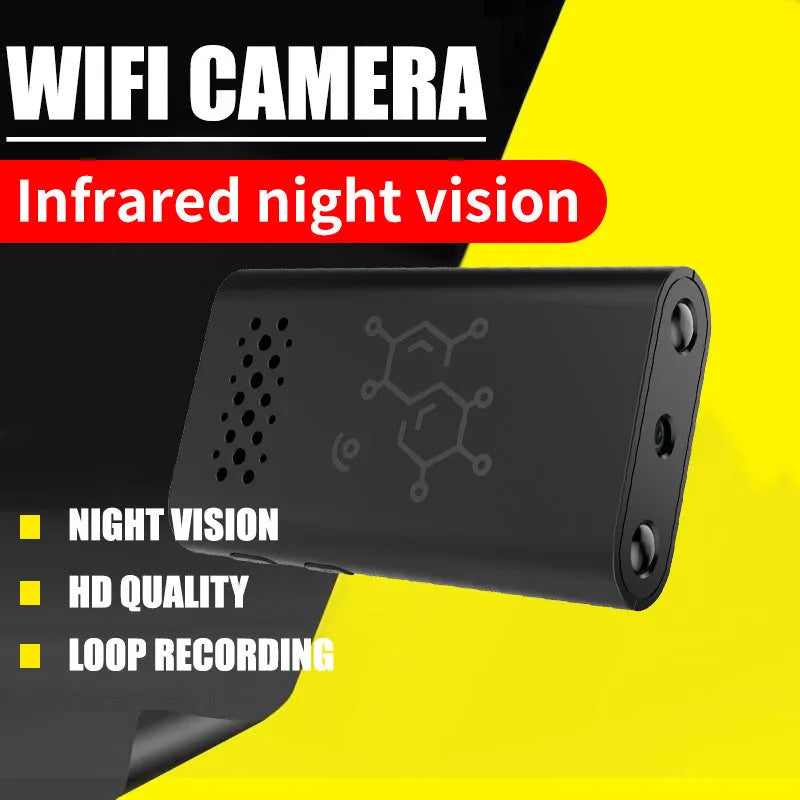 Black indoor smart security camera with WIFI and baby monitor functions on a table.