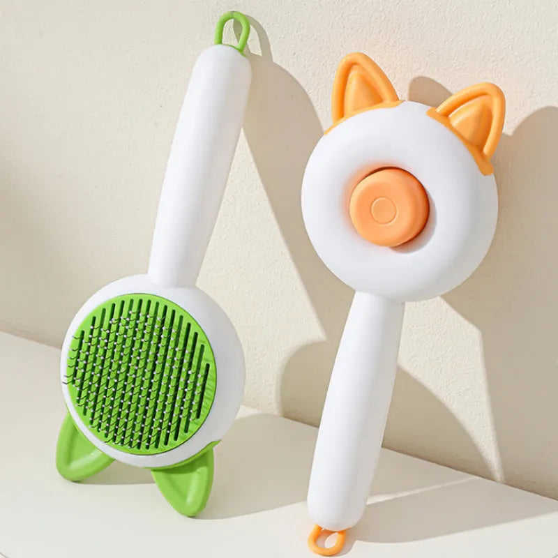 Self-cleaning cat comb grooming tool in greenish white colour with PP, TPR and stainless steel construction