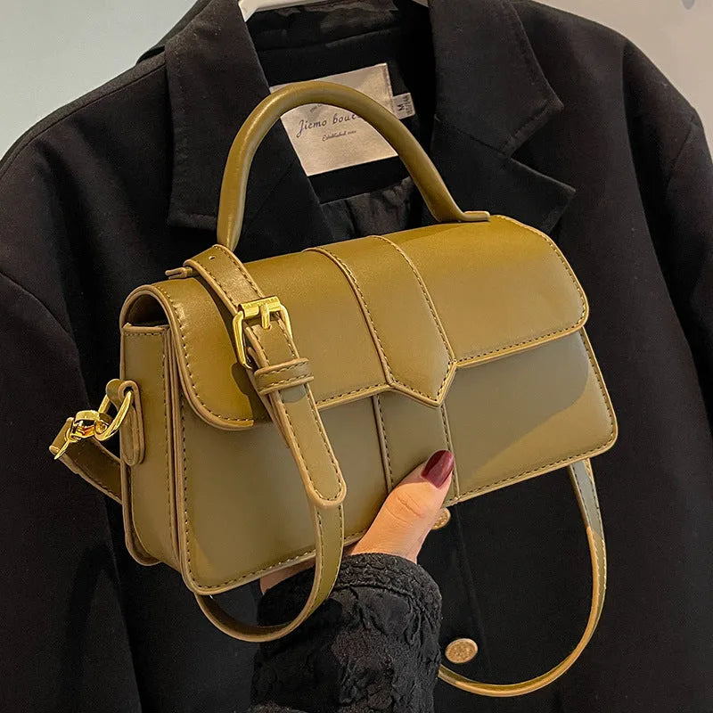 Women's beige messenger bag with horizontal square design showing external pockets and 22cm width