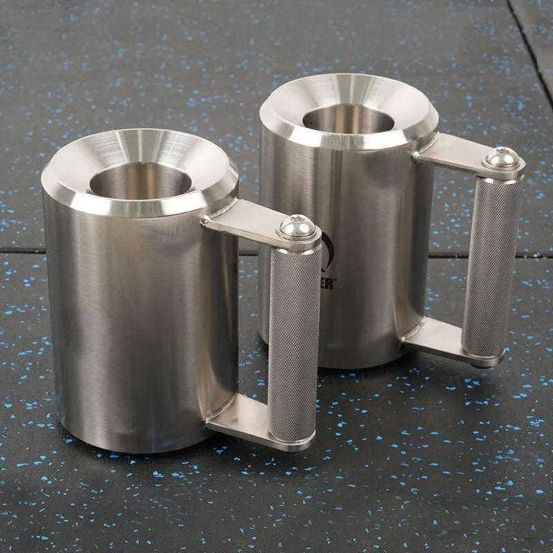 Silver 8kg stainless steel dumbbell weight plate on gym floor