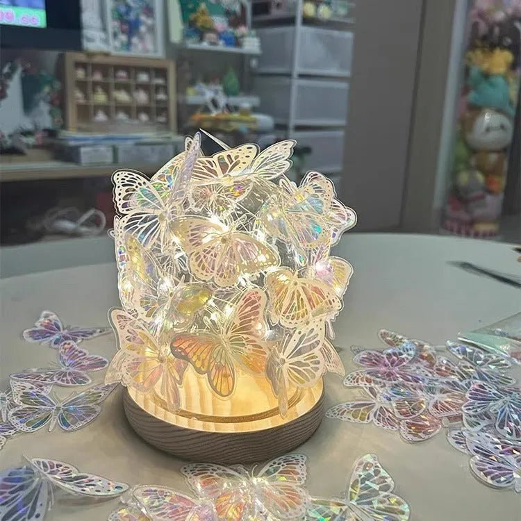Butterfly night lamp with glass shade and raw wood base measuring 12x15cm