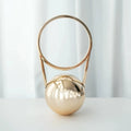 Round hard-shell PVC dinner bag with ball electroplating handle, 25x11x15cm, in silver with stitching detail and slit pocket
