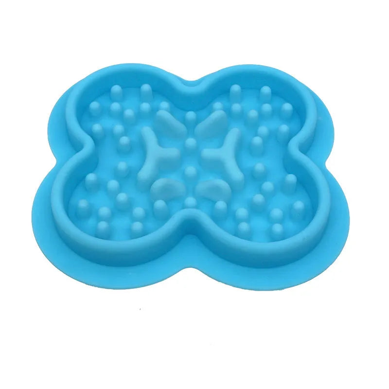 Silicone pet licking mat with textured surface and non-slip base in assorted colours.