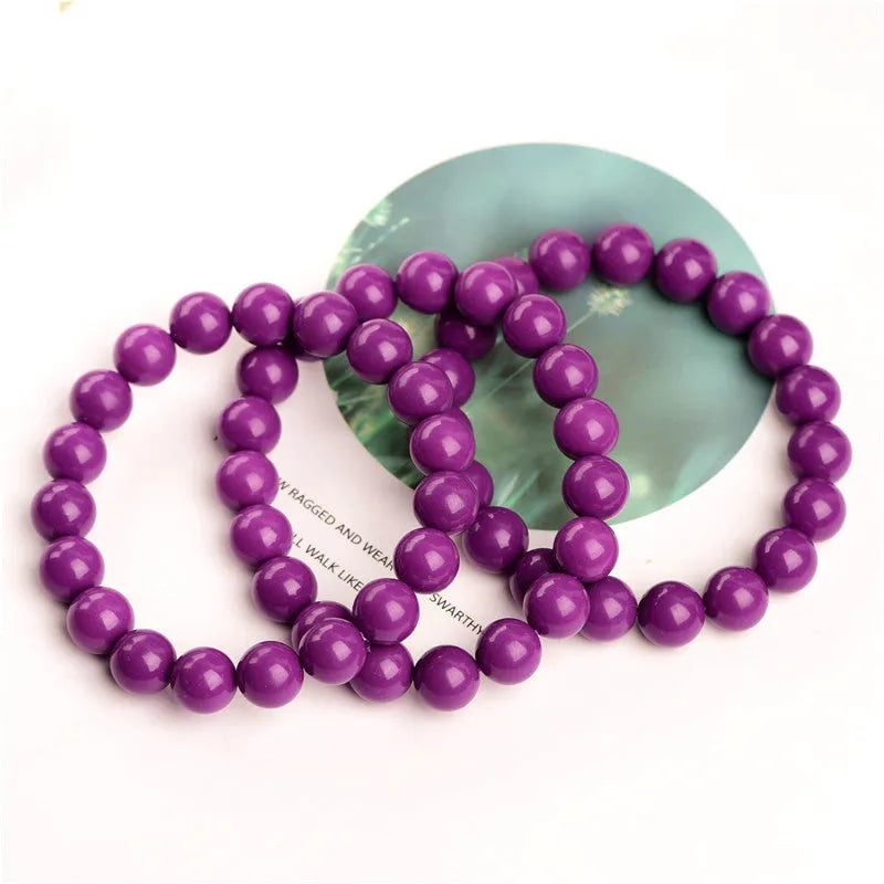 Jiuya polished purple mica crystal bracelet shown in single circle design on a wrist.