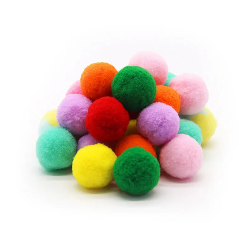 Colourful plush pet toy gun launching soft yarn balls for dogs to fetch
