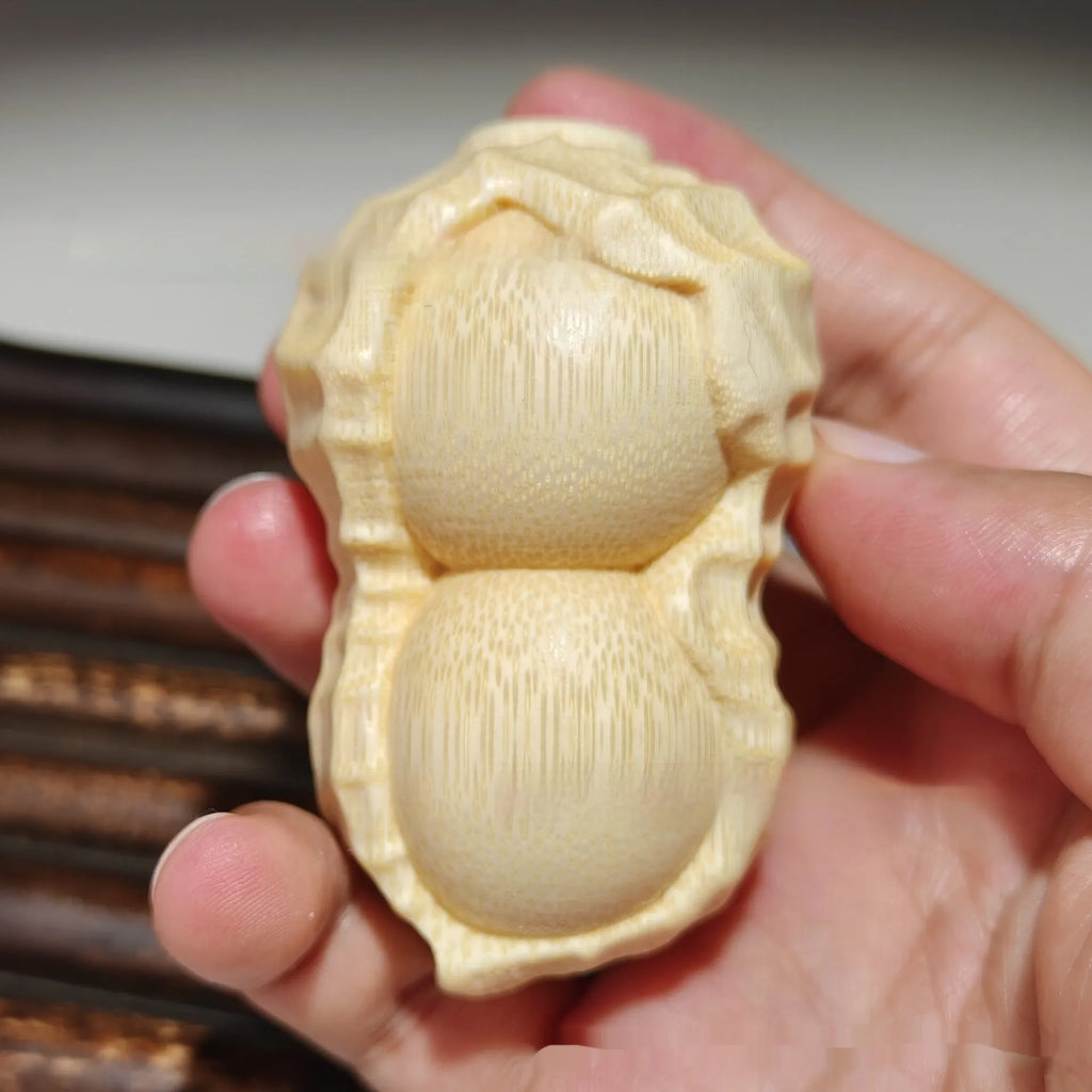 Natural bamboo carving peanut ornament with modern simplicity style and symbolic message