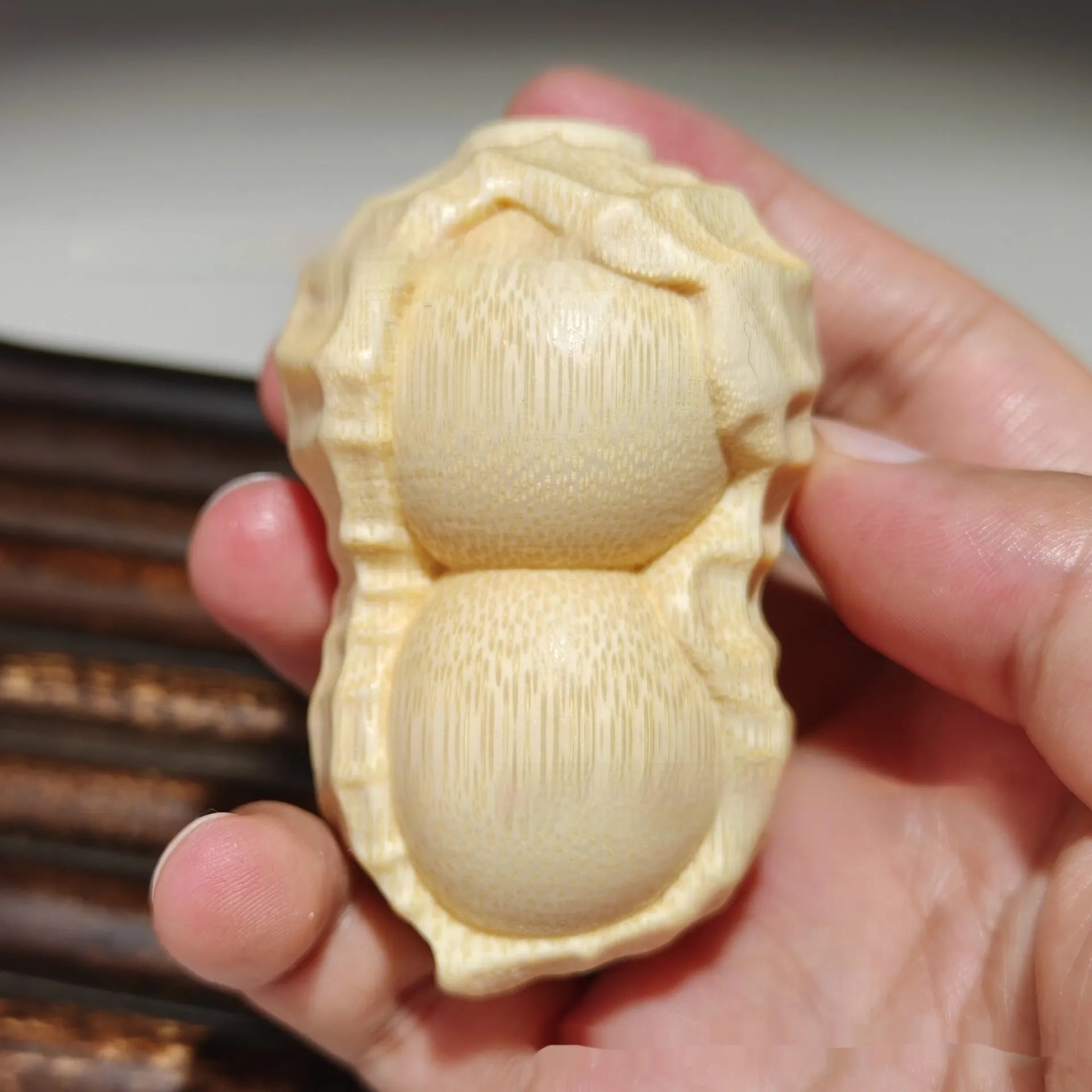 Natural bamboo carving peanut ornament with modern simplicity style and symbolic message