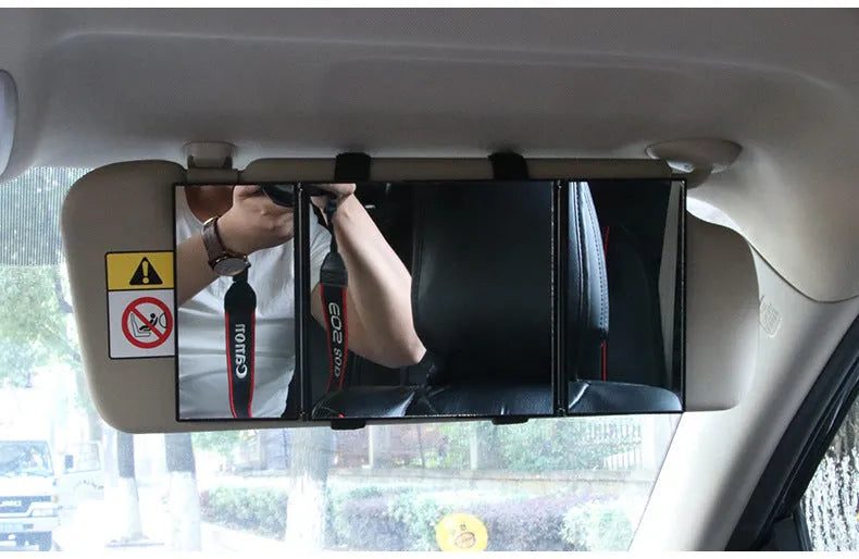 Silver car folding makeup mirror showing compact and opened positions