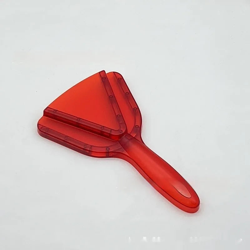Telescopic red plastic can and bottle opener with adjustable length handle on a kitchen worktop.