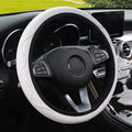 Embossed corrugated elastic steering wheel cover in black with textured surface pattern