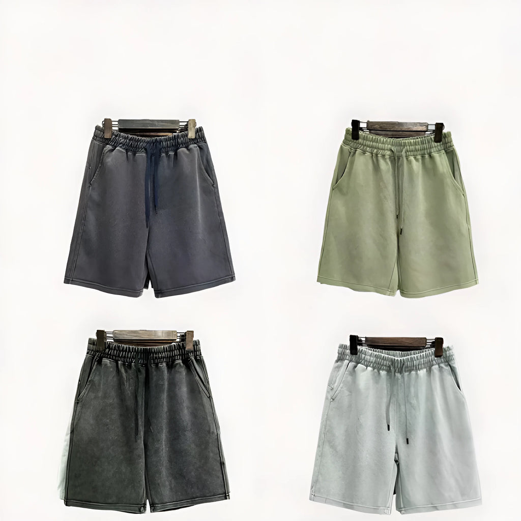 Men's loose fit distressed cotton shorts in straight leg cut with fifth pants length