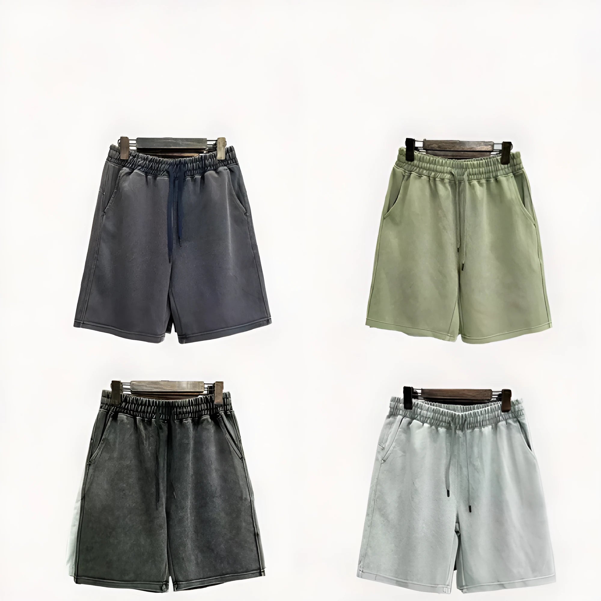 Men's loose fit distressed cotton shorts in straight leg cut with fifth pants length