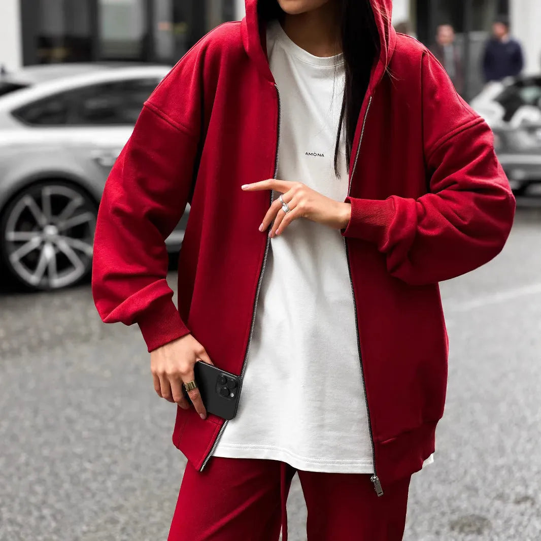 Red loose fit street style coat and trousers two-piece set on a model