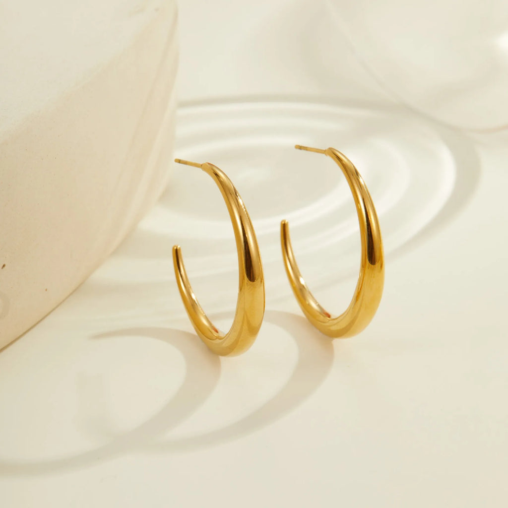 Titanium steel geometric round hoop earrings with 18K gold plating in small and large sizes