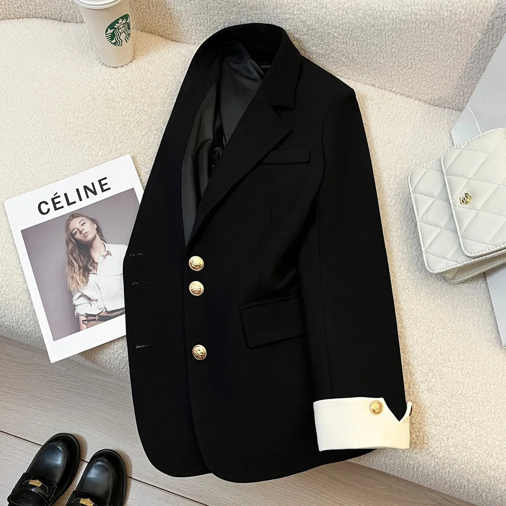 Korean style women's coat in loose fit with 65cm length and pockets in milky white colour