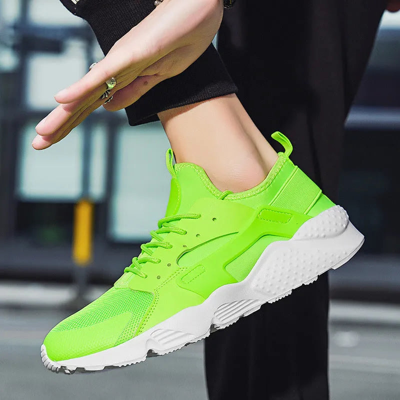 Men's low-top casual mesh shoes in green with front lace-up closure and cross shoulder strap detail
