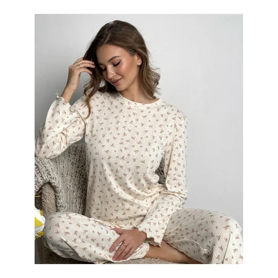 White floral print women's loungewear suit with bell sleeve top and wide-leg trousers