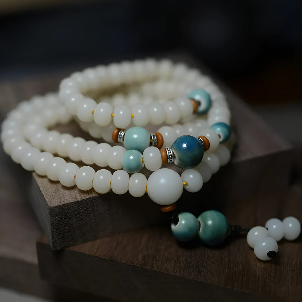 White Jade Bodhi Root Oblate Bead Bracelet with 108 natural bodhi seeds beads in 7x9mm and 8x10mm sizes