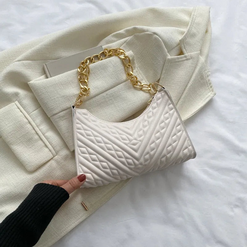 Pleated chain strap baguette shoulder bag in vertical square shape with soft PU leather exterior