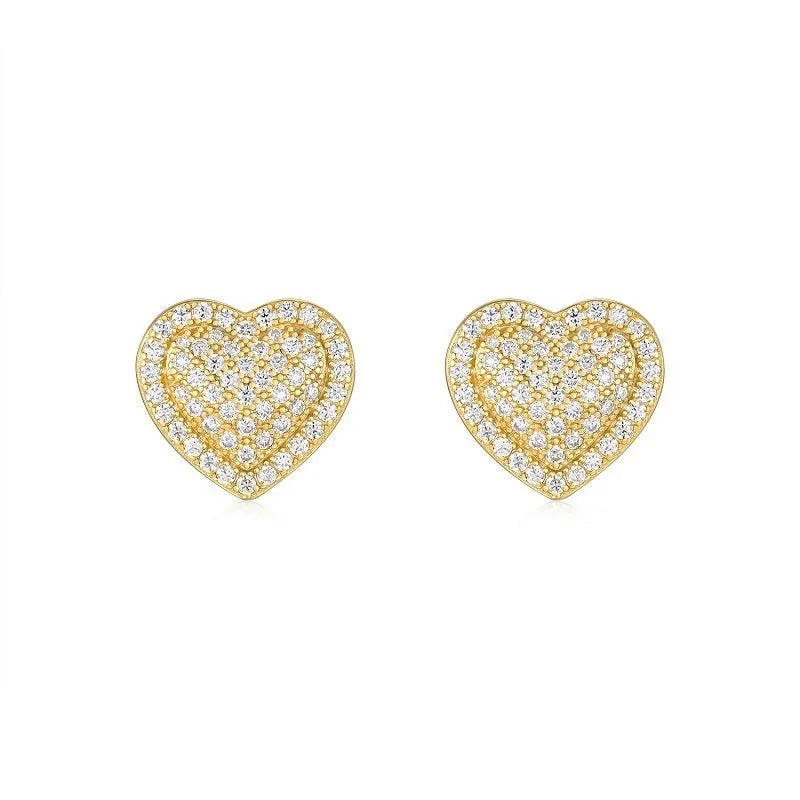 A pair of simple S925 sterling silver stud earrings with a gold-coloured finish and a heart-shaped moissanite stone.
