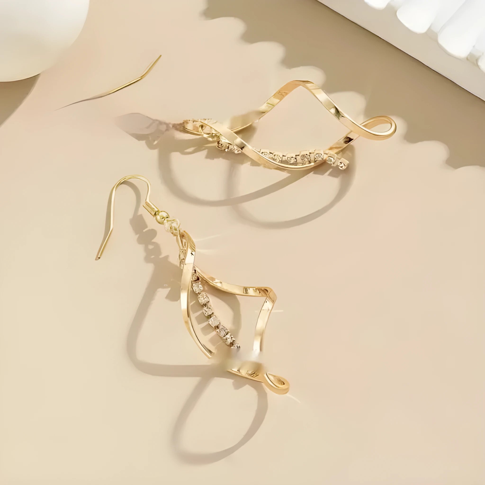 Gold electroplated alloy earrings with spiral geometric ellipse design for women