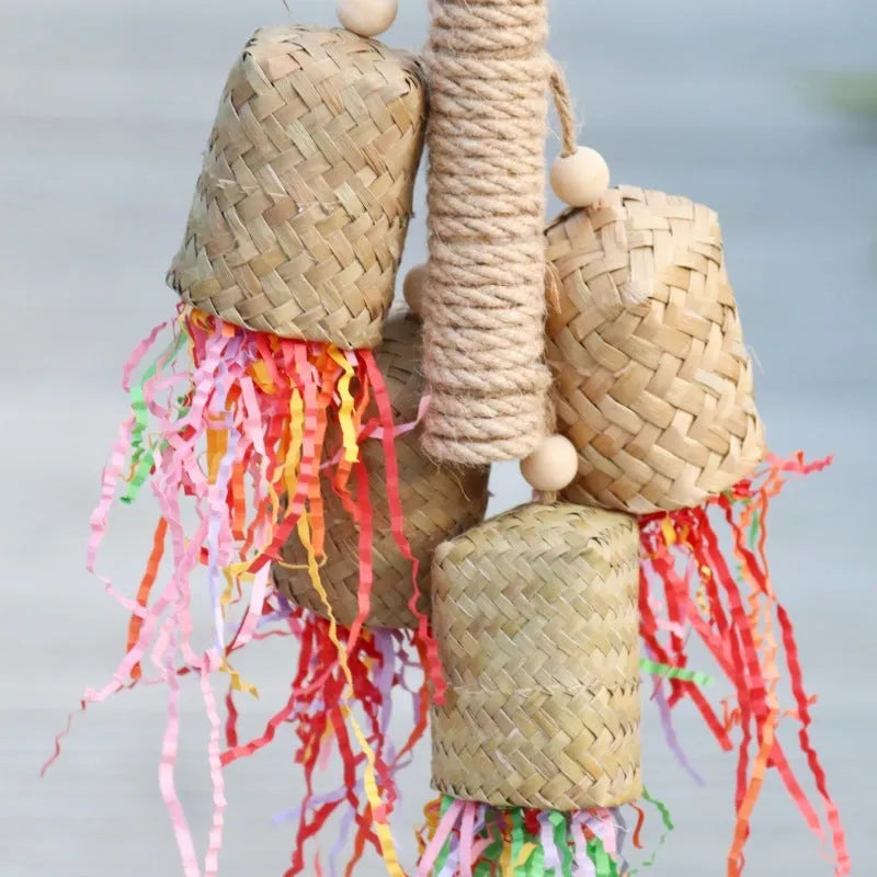 Colourful wooden parrot shredding toy with sisal fibre, measuring 15cm by 35cm.