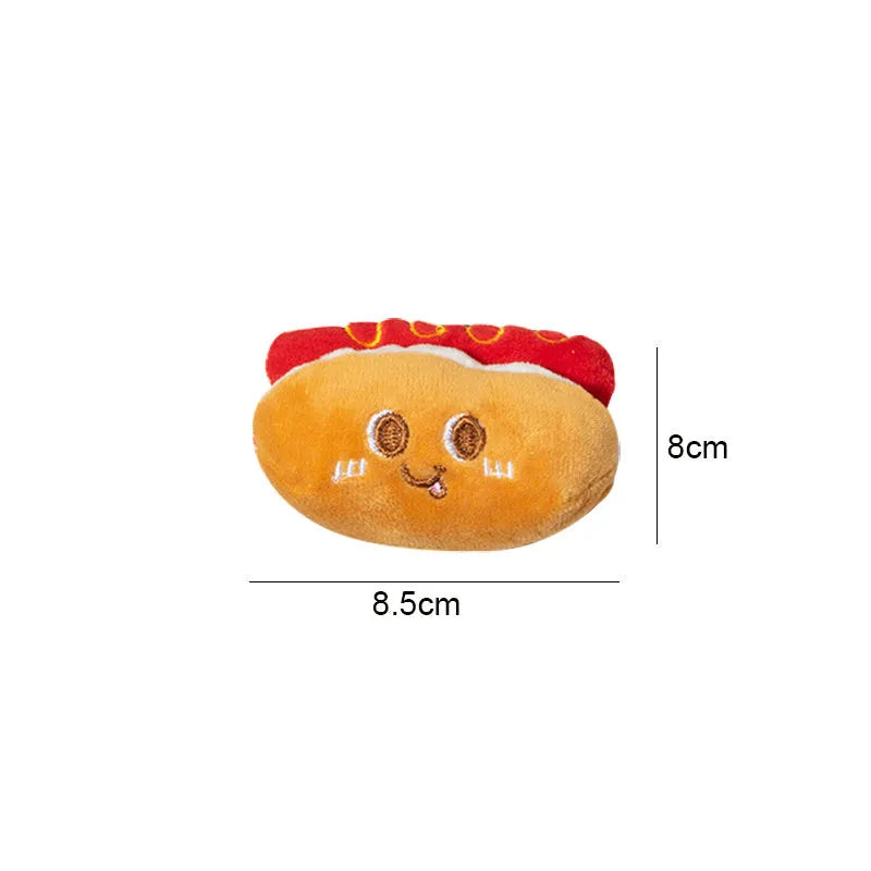 Cat mint teething toy shaped like a hamburger and chicken leg, made from soft plush fabric, on a light background.