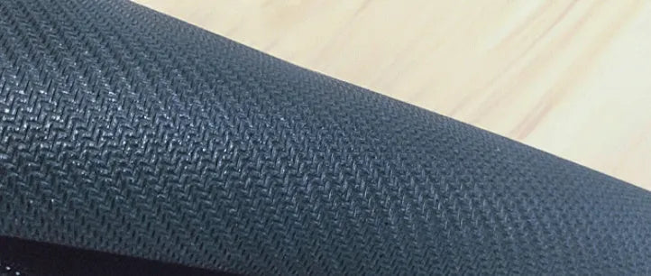 Large rectangular desk pad with printed pattern, showing non-slip natural rubber base.