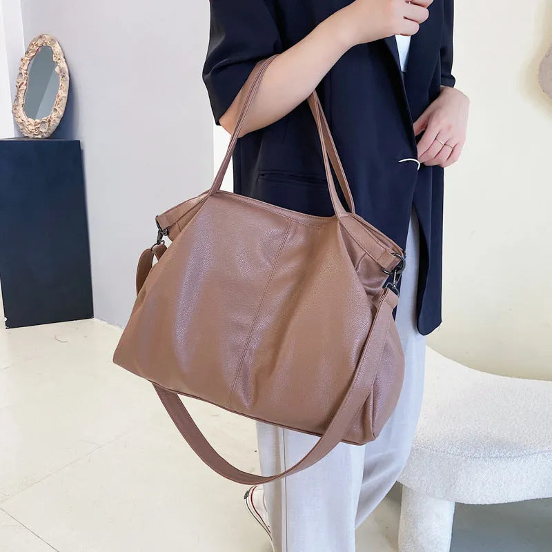 Large soft surface PU messenger tote bag in black with shoulder strap and zipper