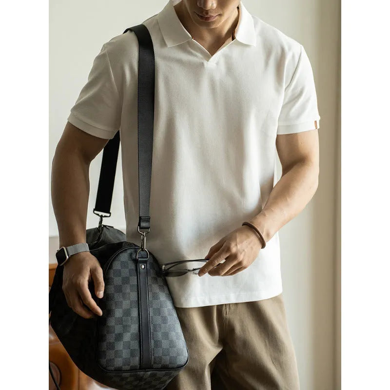 Blue cotton blend polo shirt with short sleeves displayed front view