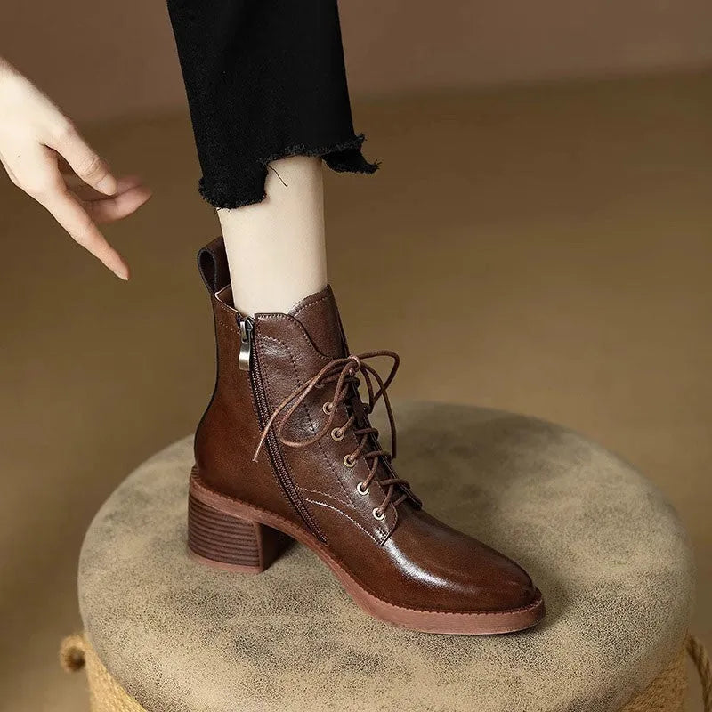 Women's black pointed-toe ankle boots with 5.5cm heel and 13cm shaft height