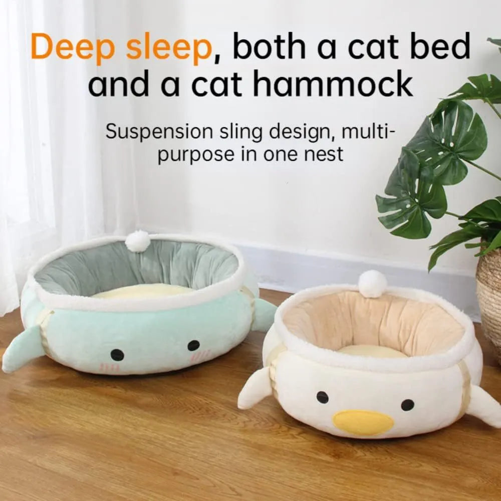 Green dinosaur and chick shaped cat bed shown both as a flat sofa and hanging as a hammock.