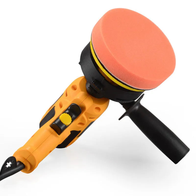 Yellow automotive polishing machine with 125mm disc on a workbench.