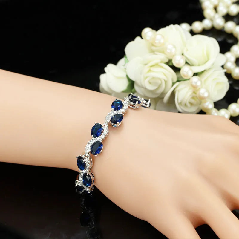 Copper plated gold zircon bracelet with geometric design in one of five colour options