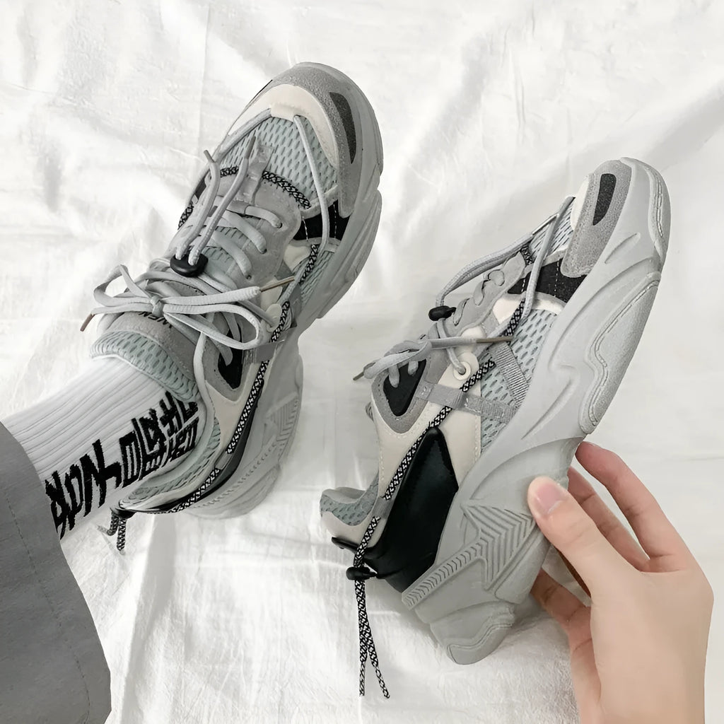 Men's white platform dad shoes with front lace-up, shown on a neutral background.