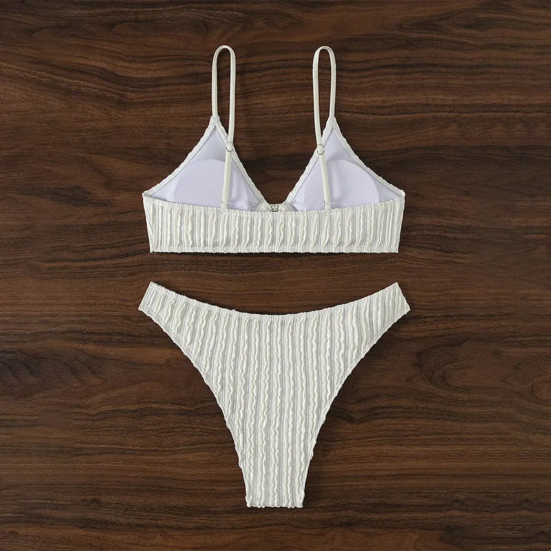 White women's V-neck swimsuit with split shorts for beach swimming
