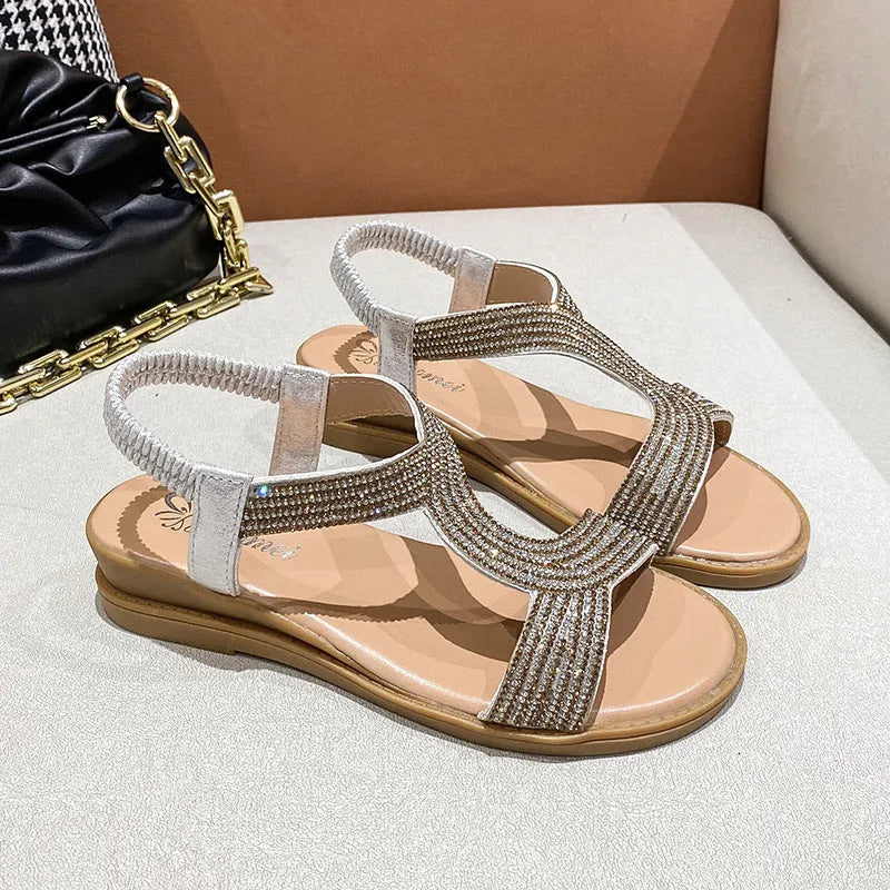 Gold patent leather women's beach sandals with rhinestone decoration and round toe holder
