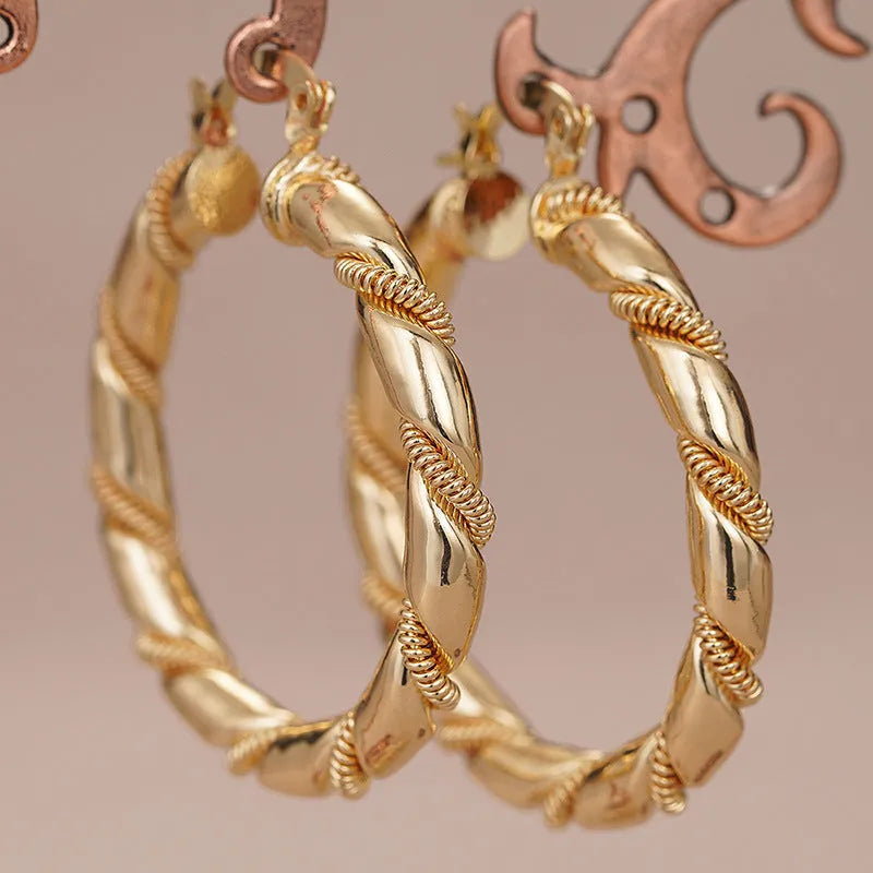 Geometric copper ear clips with linear and ring design in golden colour