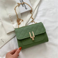 Women's diamond lattice chain crossbody bag in black, green or white with adjustable strap
