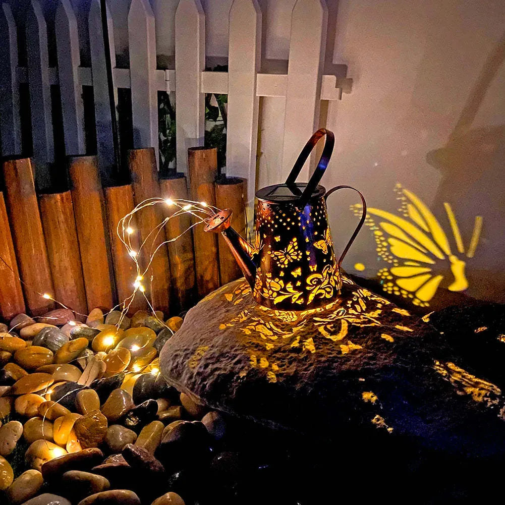 Iron butterfly solar garden lamp with warm white LED lighting