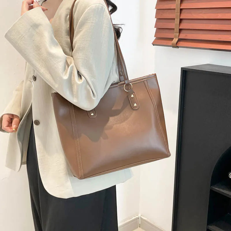 Korean style black shoulder underarm bag with horizontal square shape and sandwich pocket design